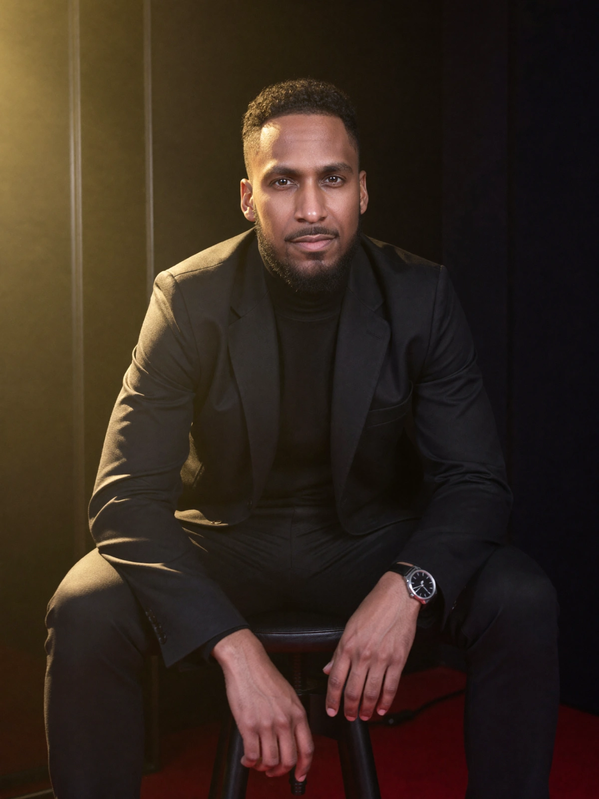 King The Kemist seated backstage